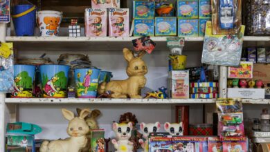 Colorful vintage toys and games on a shop shelf, evoking nostalgia and a retro vibe.