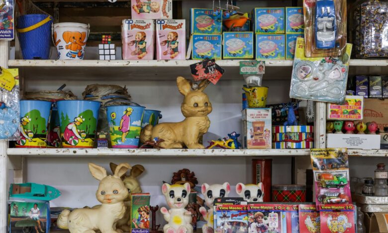 Colorful vintage toys and games on a shop shelf, evoking nostalgia and a retro vibe.