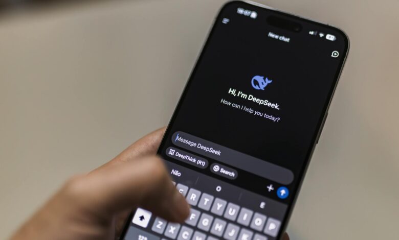 A smartphone displaying the DeepSeek AI chat interface, depicting modern technology use.
