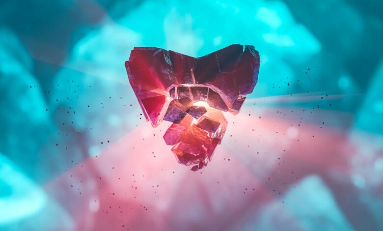 Abstract image of a shattered heart-shaped crystal glowing with vibrant light and particles.