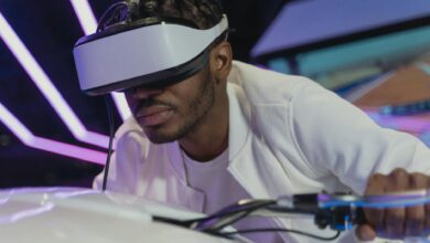 A man deeply engaged in virtual reality gaming with a VR headset, creating a futuristic and immersive experience.