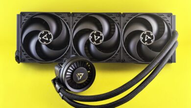 Triple fan CPU cooler with colorful background, efficient for gaming PCs.