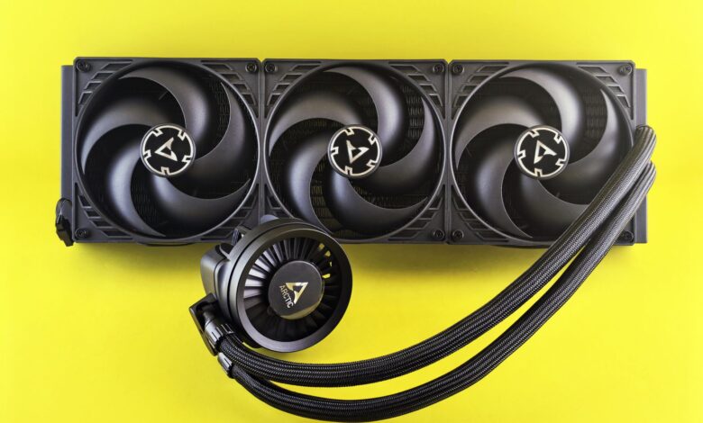 Triple fan CPU cooler with colorful background, efficient for gaming PCs.