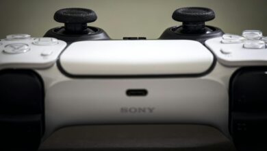 Detailed view of a Sony PlayStation 5 DualSense controller, highlighting design and features.