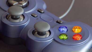 Detailed close-up of a gaming controller emphasizing its vibrant buttons.