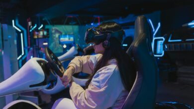 Young woman immersed in a virtual reality racing game in a futuristic setting.