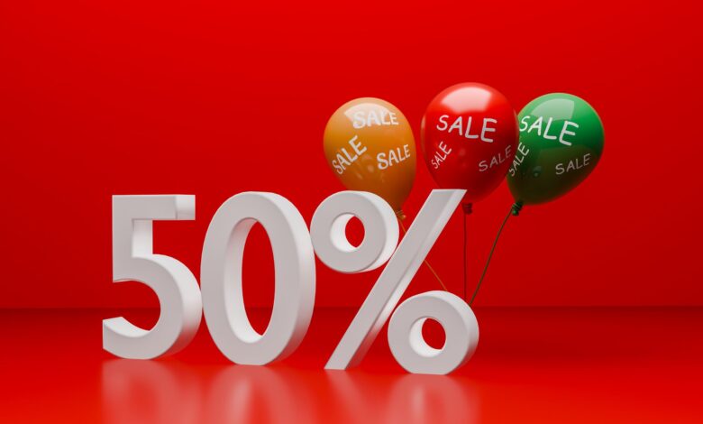 Bright red promotional image showcasing a 50% sale with balloons.