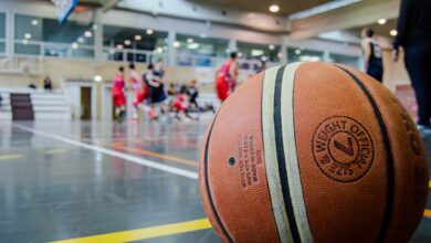 Captivating indoor basketball scene with players actively engaged in a game.