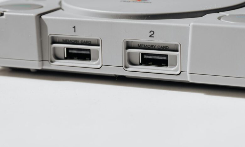 Detailed view of vintage PlayStation console featuring memory slots, capturing nostalgia.