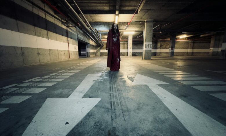 Creepy apparition in a dim parking garage setting. Perfect for horror themes.