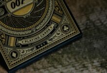 Close-up of luxury 007 themed playing cards with intricate design.