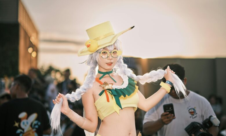 Vibrant cosplay character featuring a woman in a yellow costume at an outdoor event.