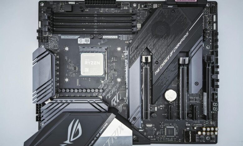 Detailed close-up of a gaming motherboard featuring advanced chip technology.