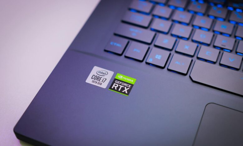 Laptop keyboard with Intel Core i7 and NVIDIA GeForce RTX stickers, symbolizing high-performance computing power.