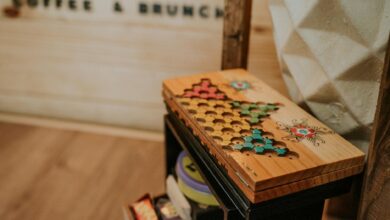 A nostalgic wooden board game set in a cozy cafe setting, evoking retro vibes.