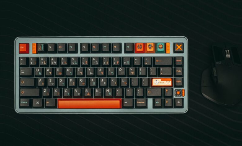 Stylish mechanical keyboard with gaming keys and ergonomic mouse on dark background.