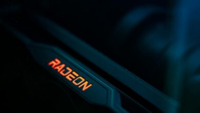 Detailed view of a glowing Radeon graphics card highlighting its hardware design.