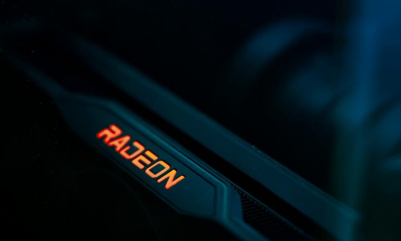 Detailed view of a glowing Radeon graphics card highlighting its hardware design.