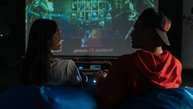 Two friends enjoy a cozy gaming night together on a video game console.