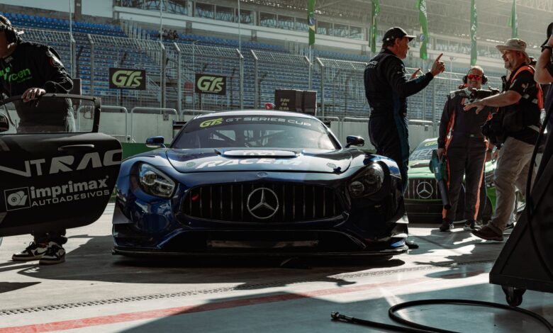 GT Series Cup race car and team preparing for the race on the track.