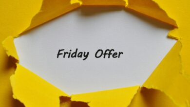 Yellow torn paper reveals Friday offer message, perfect for promotions.