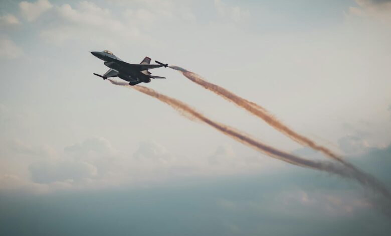 Dynamic capture of a military fighter jet soaring through a cloudy sky.