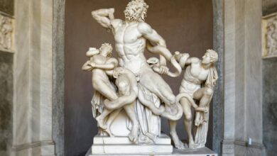Intricate marble sculpture of Laocoön and his sons battling serpents, a masterpiece of classical art.