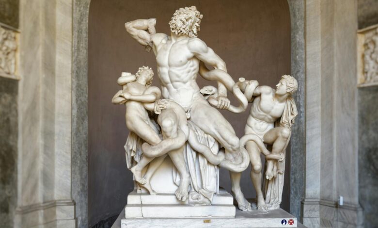 Intricate marble sculpture of Laocoön and his sons battling serpents, a masterpiece of classical art.