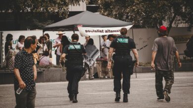 Police officers monitoring a protest in Brisbane City, Australia.