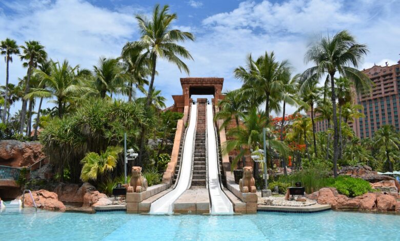 Experience thrilling leisure at Atlantis waterpark, Bahamas with lush tropical scenery.