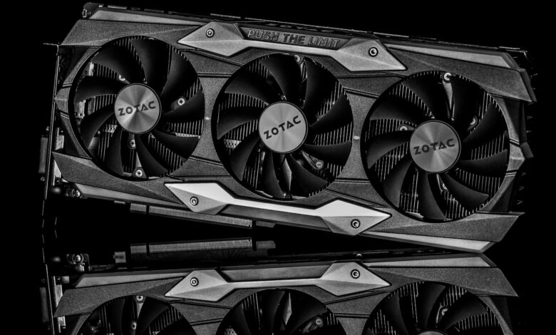 Black and white image of a graphics card with technology theme and metal reflection.