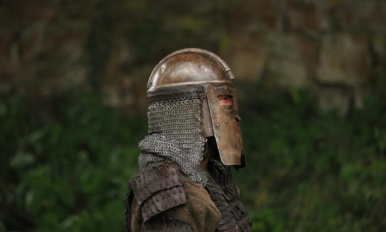 A knight in full medieval armor standing outdoors in Höxter, Germany.
