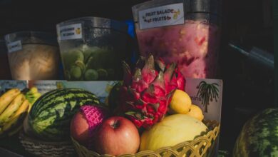 Vibrant display of tropical fruits at a Manila market stall, perfect for culinary and travel themes.
