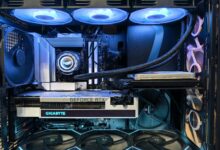 Close-up of an advanced gaming desktop PC with GeForce RTX, liquid cooling, and RGB lighting.