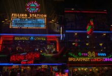 Neon signs of Filling Station Bar Cafe showcasing 24-hour service, breakfast, and coffee.
