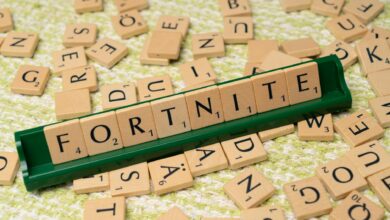 Scrabble tiles forming the word Fortnite, symbolizing gaming creativity and fan art.