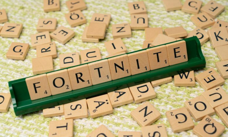 Scrabble tiles forming the word Fortnite, symbolizing gaming creativity and fan art.
