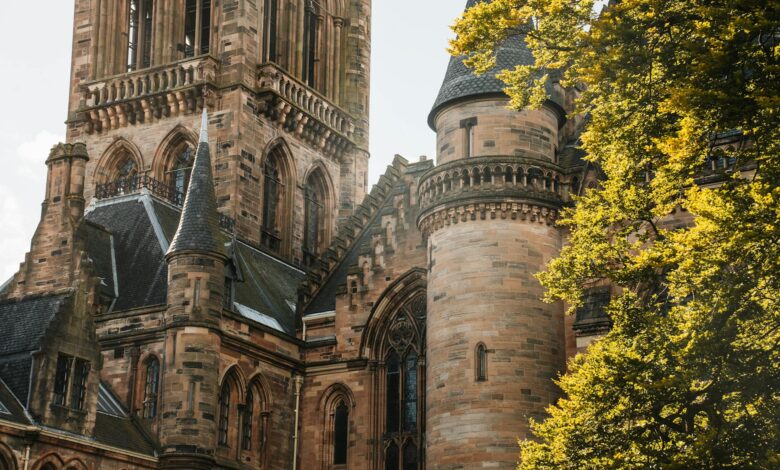 Stunning close-up of historic Scottish architecture in warm sunlight showcasing Neo-Gothic design.