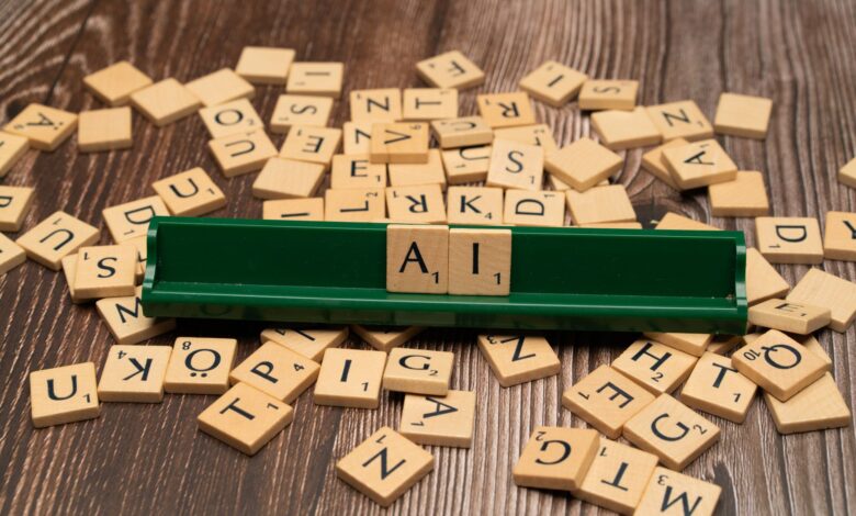 Wooden letter tiles spelling AI, representing technology and innovation.