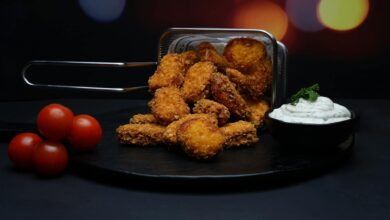 Delicious crispy nuggets served with fresh cherry tomatoes and a side of creamy dipping sauce.