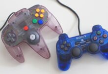 Two translucent gaming controllers, Sony PlayStation and Nintendo, on a white surface.
