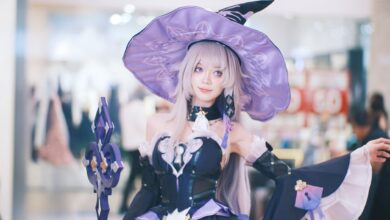 A captivating fantasy-themed cosplay of a witch inside a shopping mall.