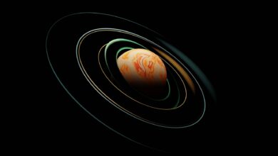A vibrant abstract planet surrounded by intricate orbits in space.