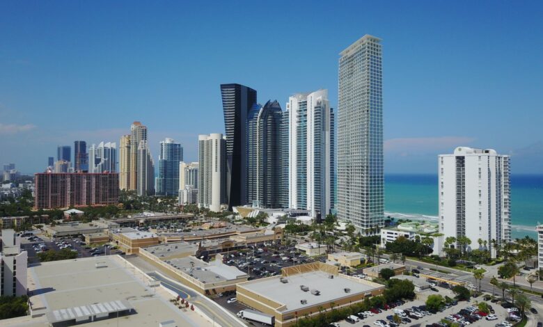 High-rise buildings along the coast of Sunny Isles Beach, Florida on a clear day.