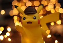 A close-up of a Pikachu figurine illuminated by a warm bokeh effect, creating an eye-catching visual.