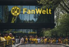 Fans gather at Dortmund's Fanwelt outside Signal Iduna Park on match day.