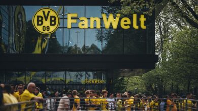 Fans gather at Dortmund's Fanwelt outside Signal Iduna Park on match day.