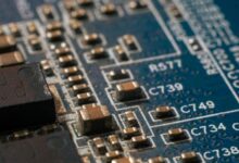 Detailed macro shot of a circuit board highlighting electronic components and traces.