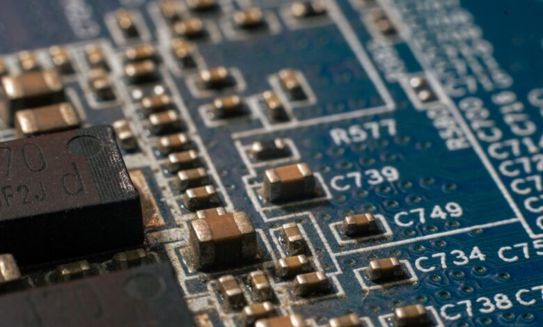 Detailed macro shot of a circuit board highlighting electronic components and traces.