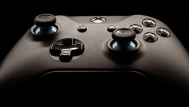 A detailed close-up of a modern gaming controller highlighting its design and functionality.